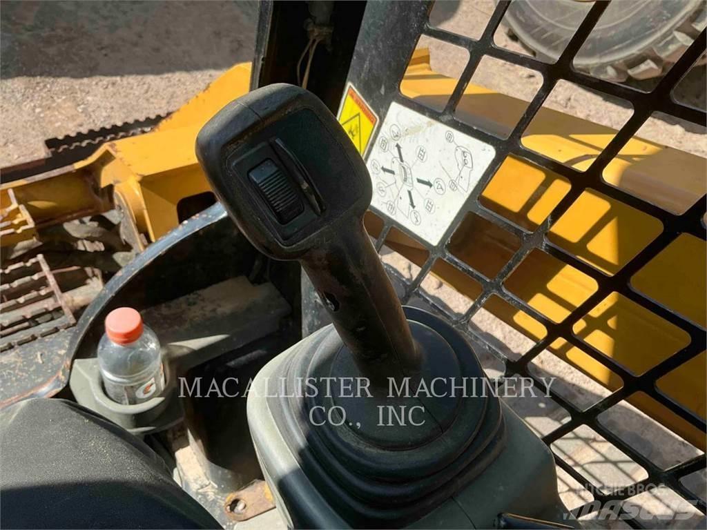 CAT 289D Гусеничні вантажники