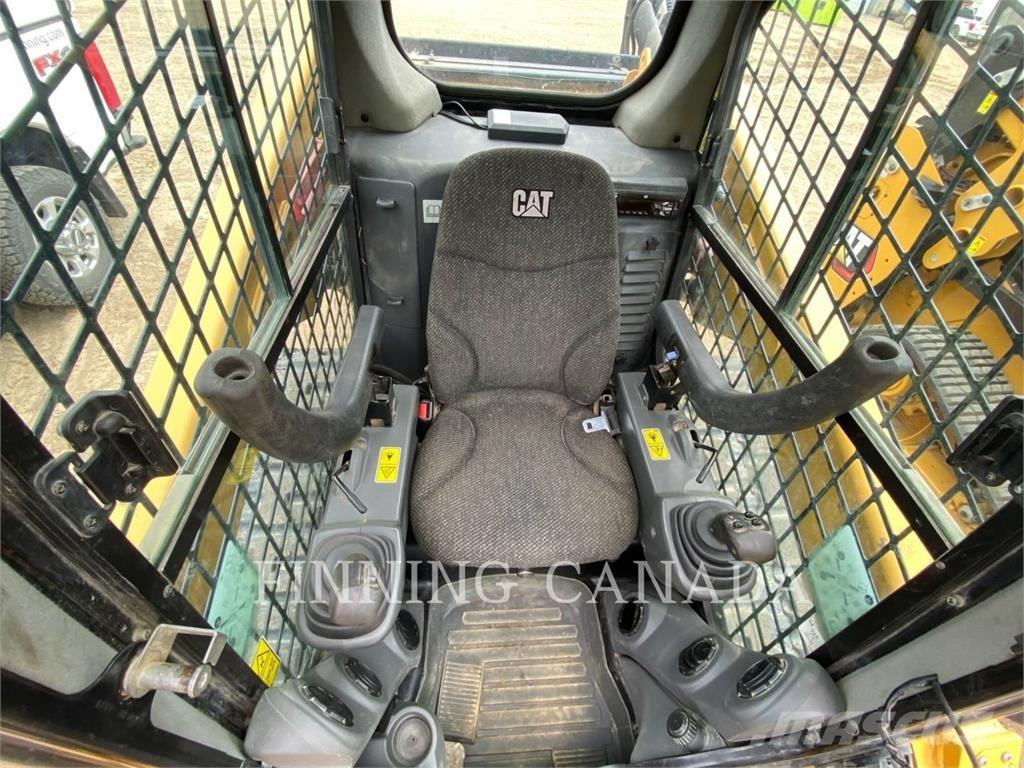 CAT 289D Гусеничні вантажники
