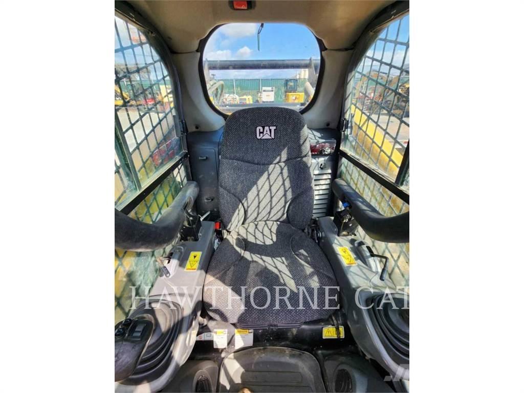 CAT 289D Гусеничні вантажники