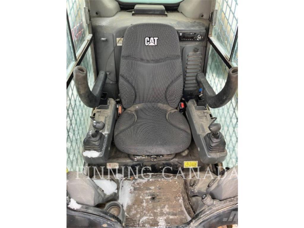 CAT 289D3 Гусеничні вантажники