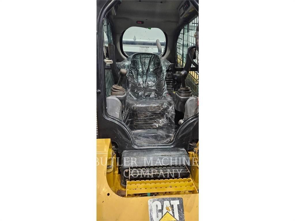CAT 299D2 Гусеничні вантажники