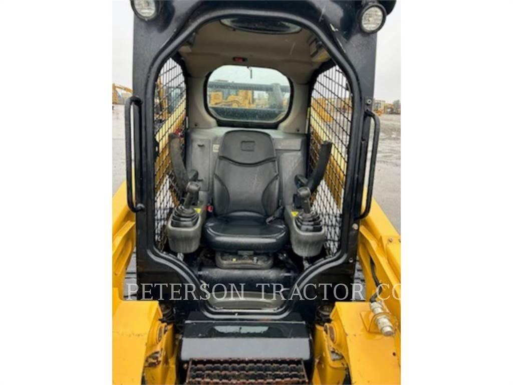 CAT 299D2 Гусеничні вантажники