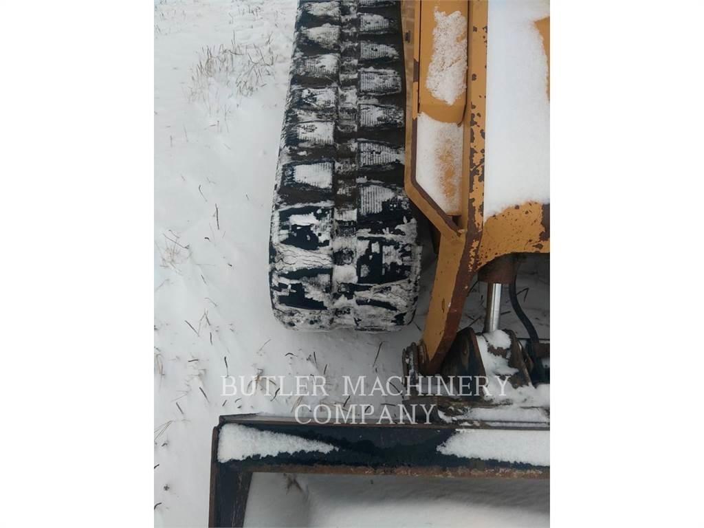 CAT 299D2 Гусеничні вантажники