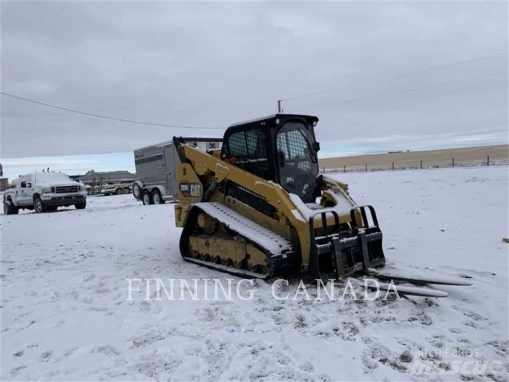 CAT 299D2 Гусеничні вантажники