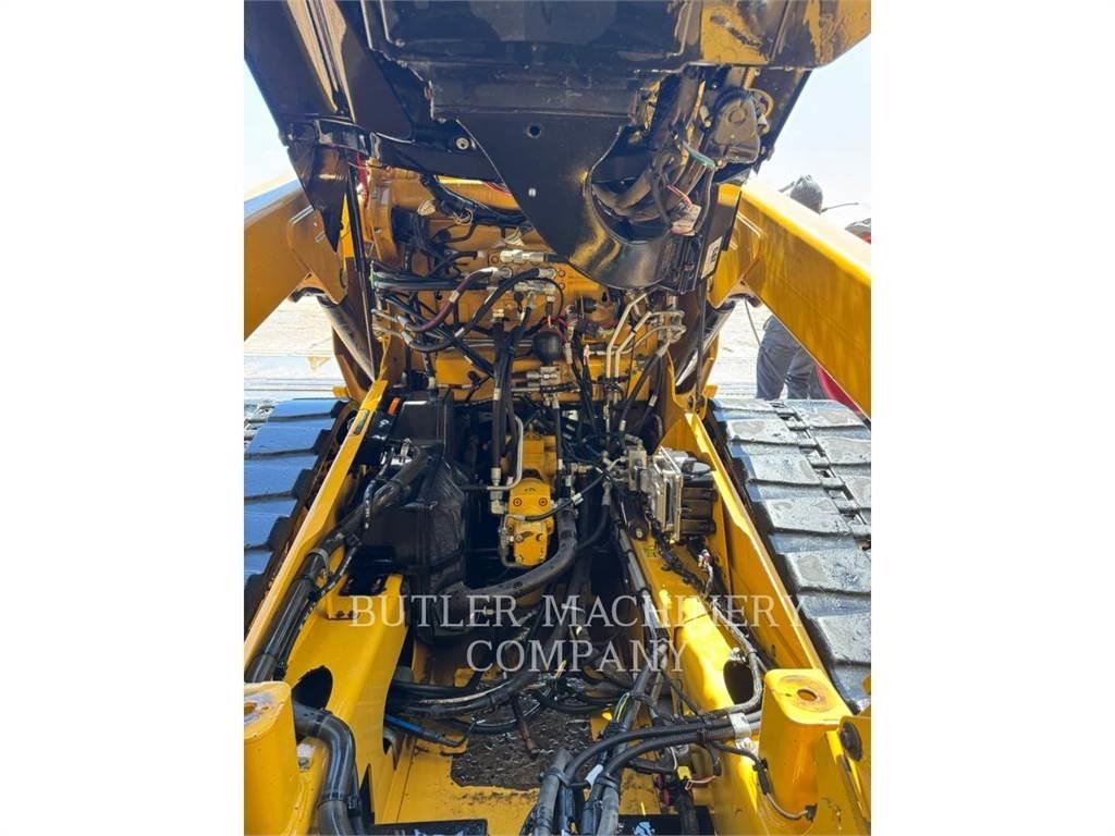 CAT 299D2 Гусеничні вантажники