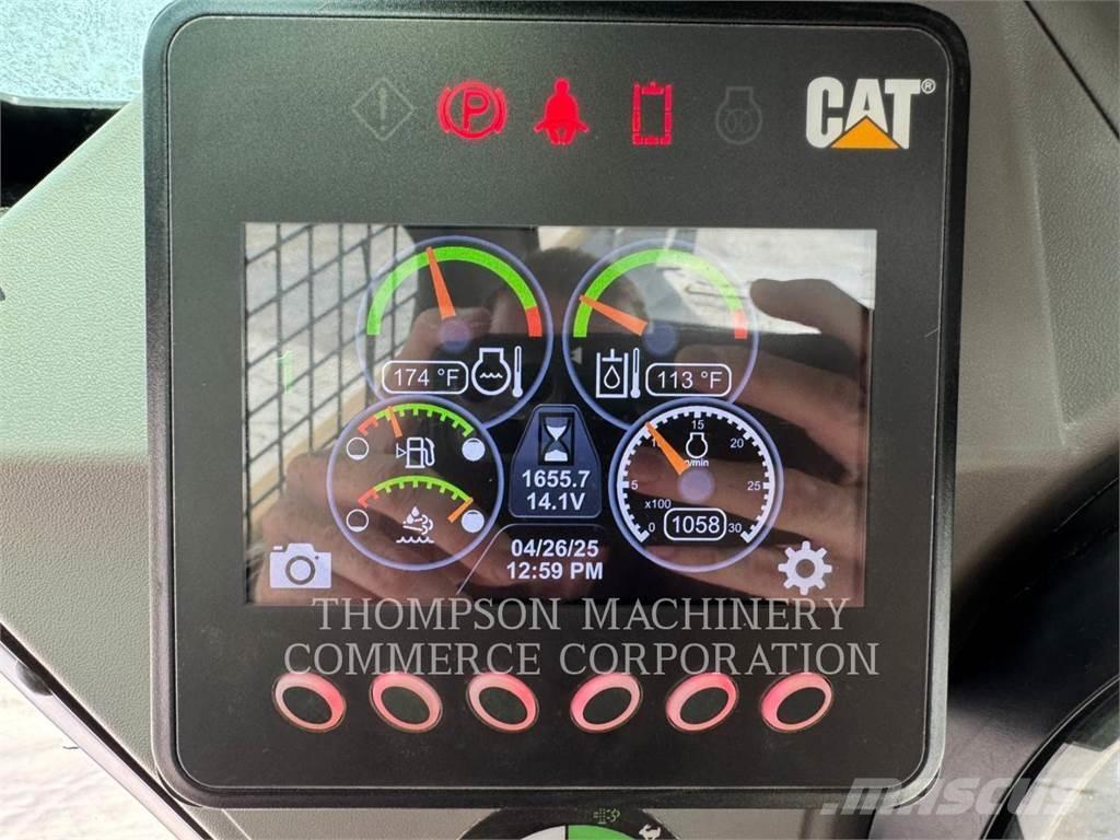 CAT 299D2 Гусеничні вантажники