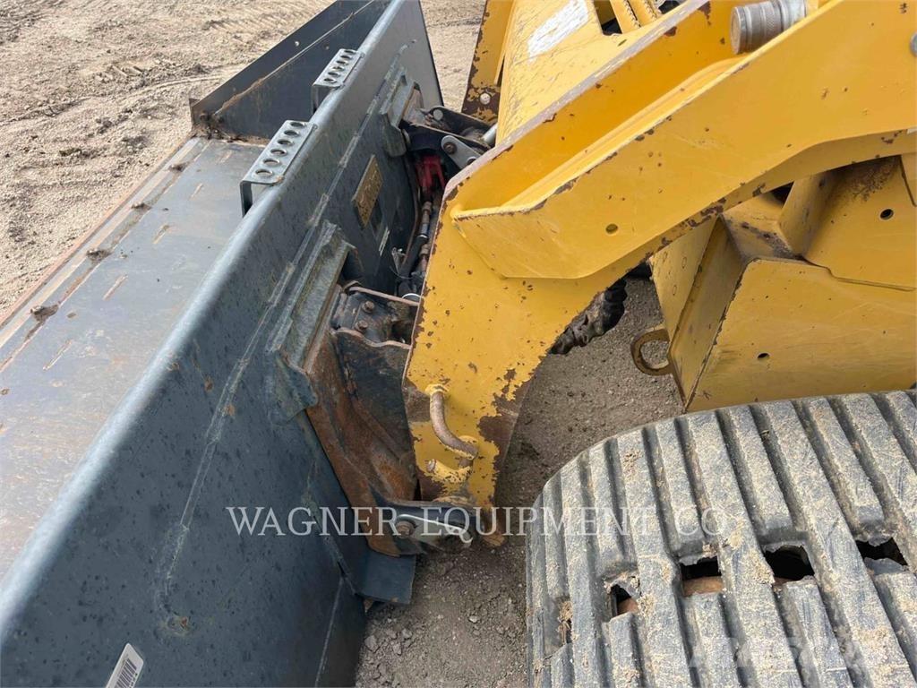 CAT 299D2 Гусеничні вантажники