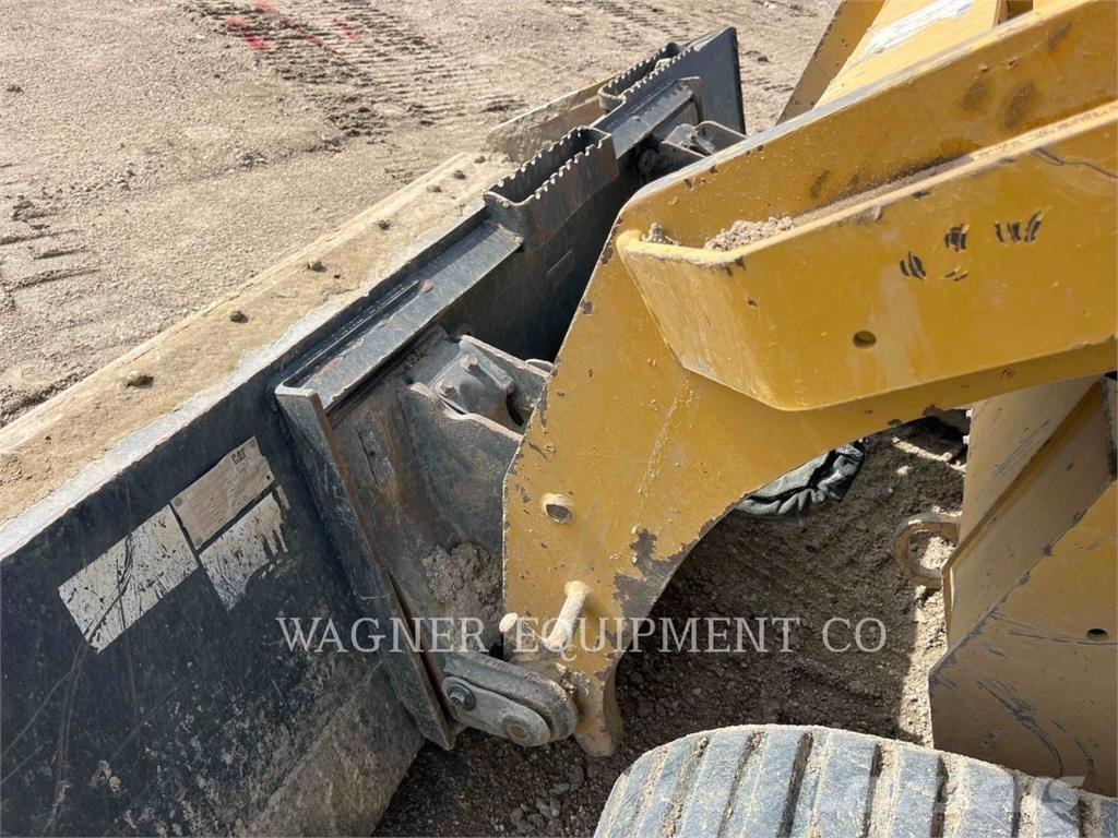 CAT 299D2 Гусеничні вантажники