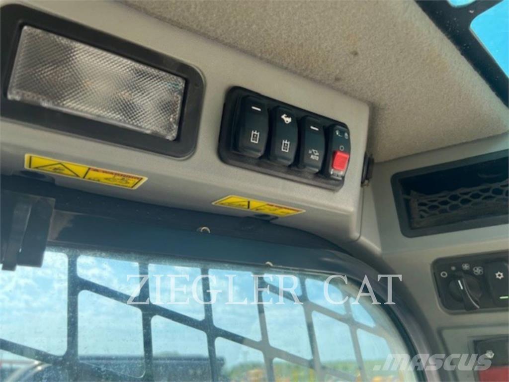 CAT 299D3 Гусеничні вантажники