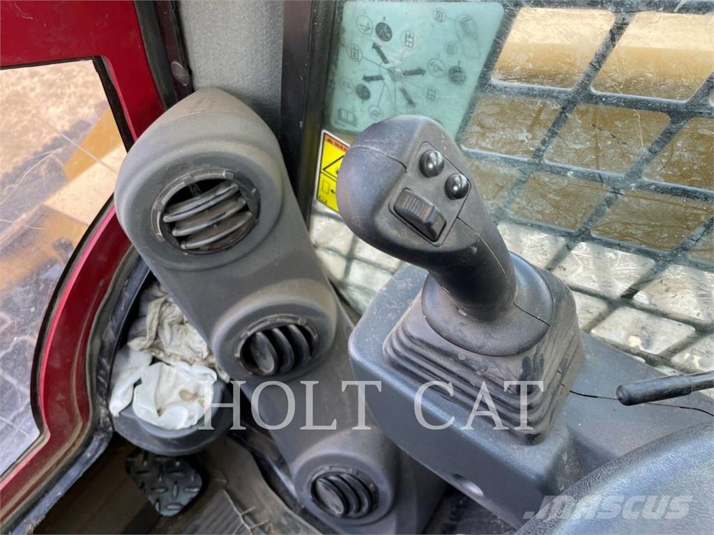 CAT 299D3XE Гусеничні вантажники