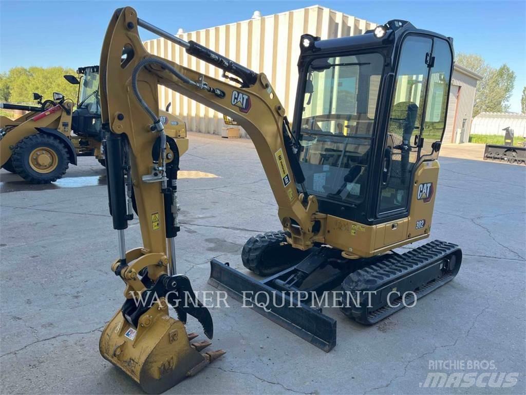 CAT 302 Гусеничні екскаватори