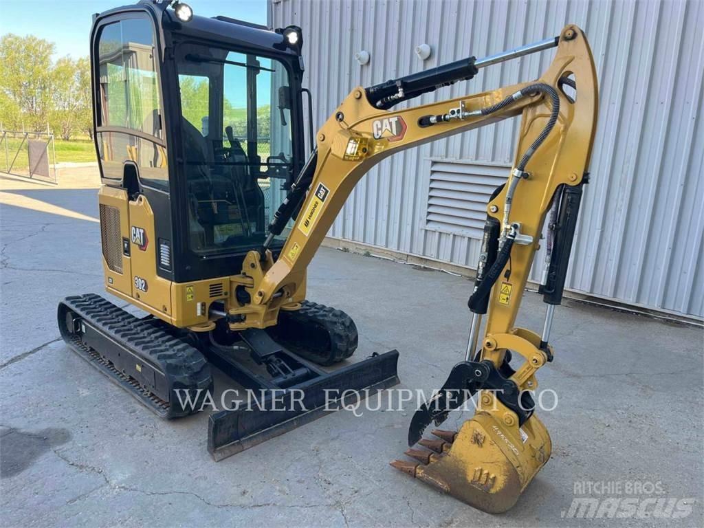 CAT 302 Гусеничні екскаватори