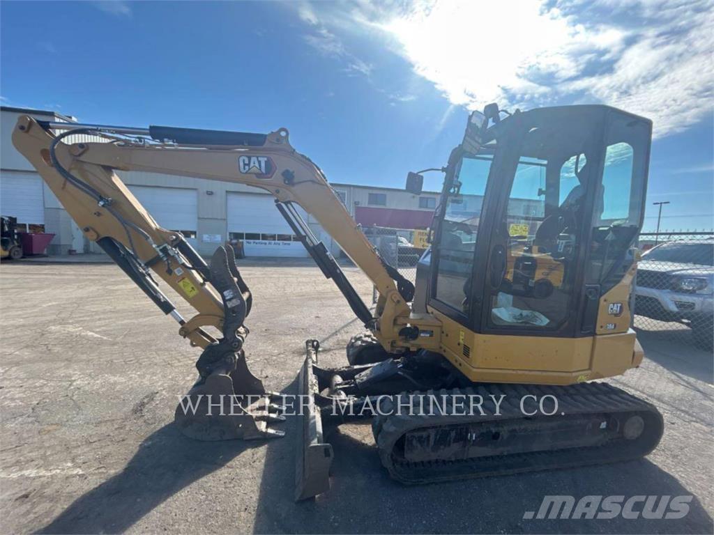 CAT 304 C3 TH Гусеничні екскаватори