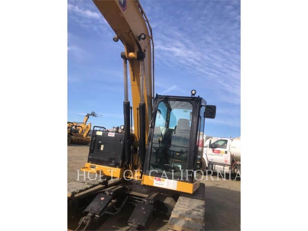 CAT 310 Гусеничні екскаватори