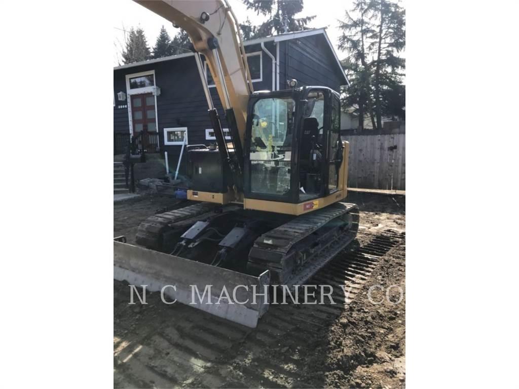 CAT 310 Гусеничні екскаватори