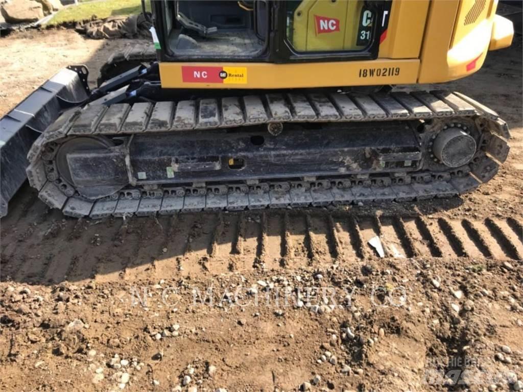 CAT 310 Гусеничні екскаватори