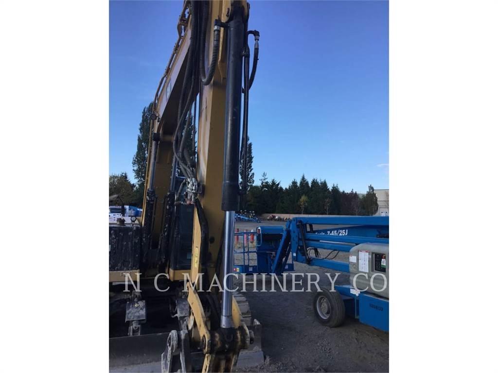 CAT 310 Гусеничні екскаватори