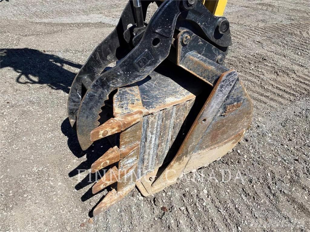 CAT 310-07 Гусеничні екскаватори