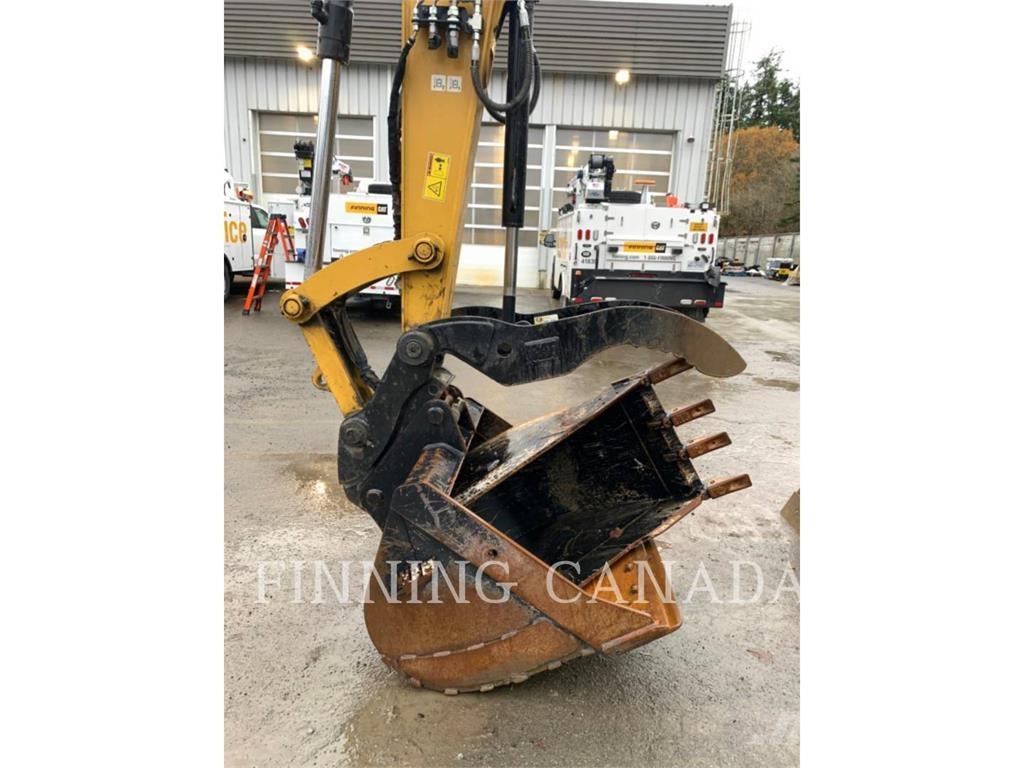 CAT 310-07 Гусеничні екскаватори