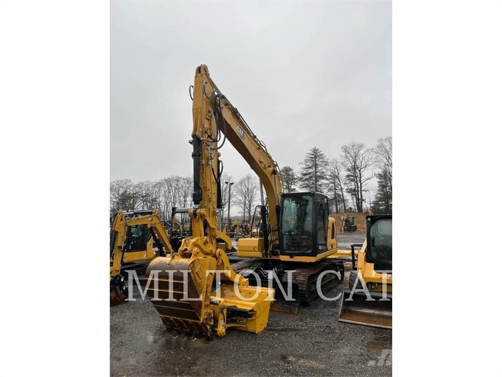 CAT 313 Гусеничні екскаватори
