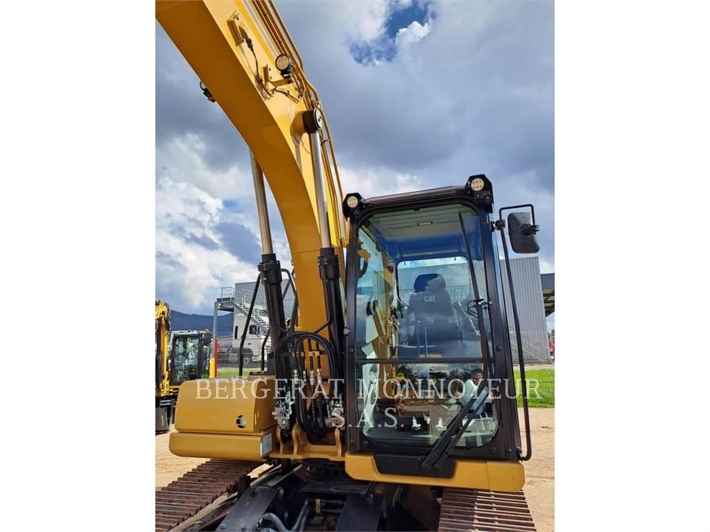 CAT 313 Гусеничні екскаватори