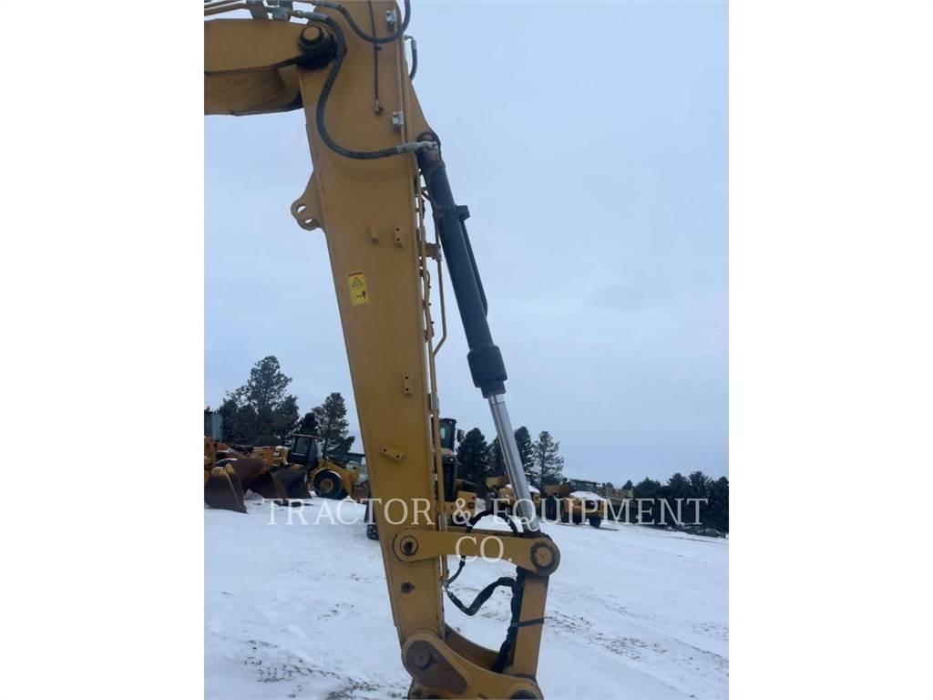 CAT 313 Гусеничні екскаватори