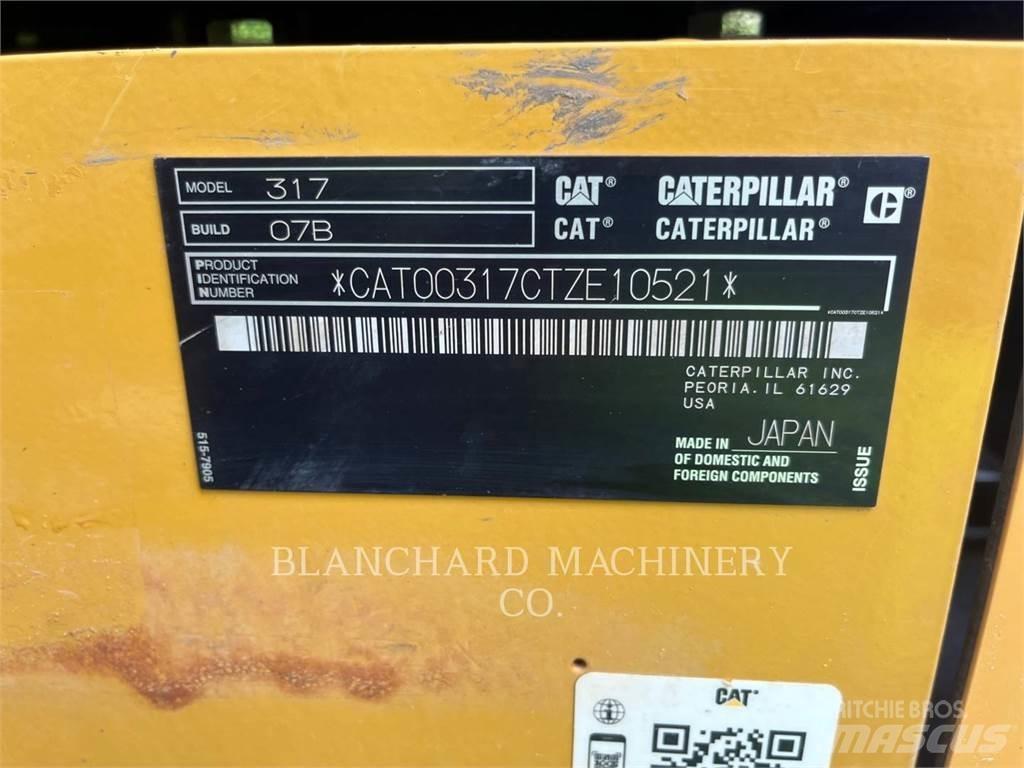 CAT 317 Гусеничні екскаватори