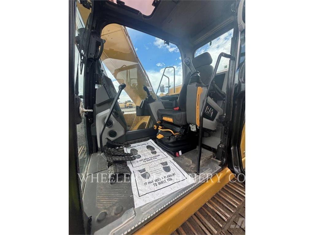 CAT 317 Гусеничні екскаватори