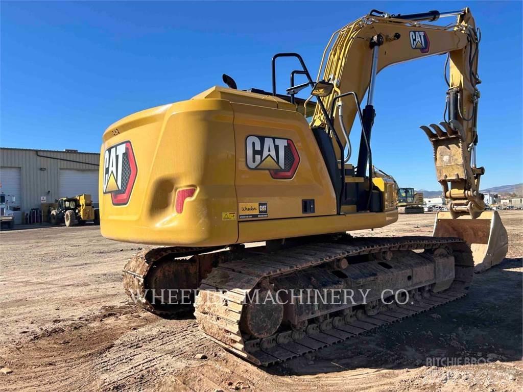 CAT 317 TH Гусеничні екскаватори