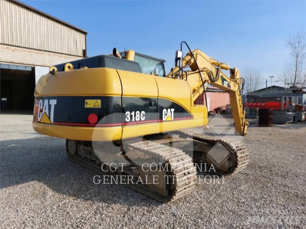 CAT 318C Гусеничні екскаватори