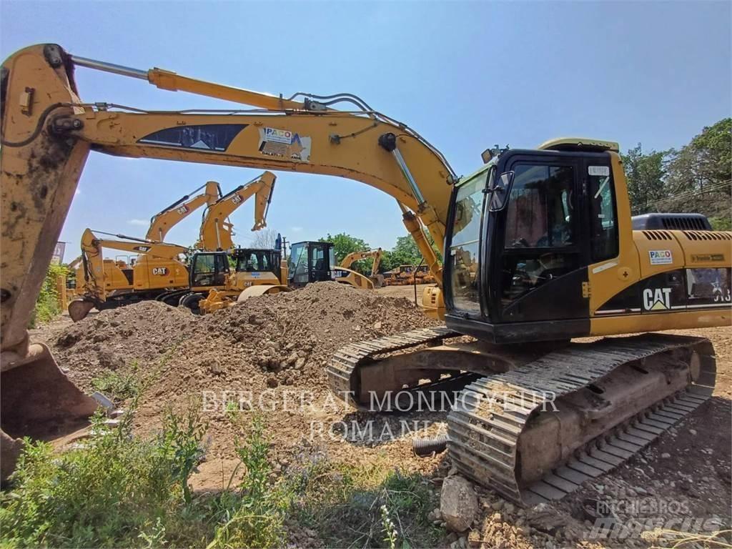 CAT 318C Гусеничні екскаватори