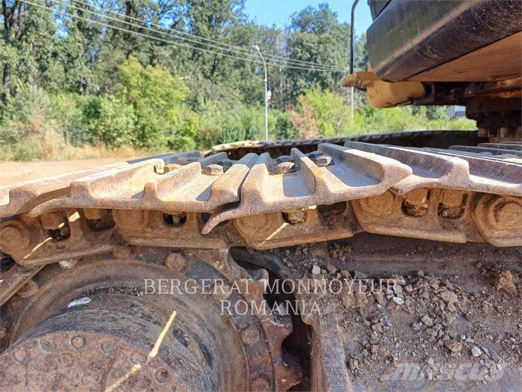 CAT 318C Гусеничні екскаватори