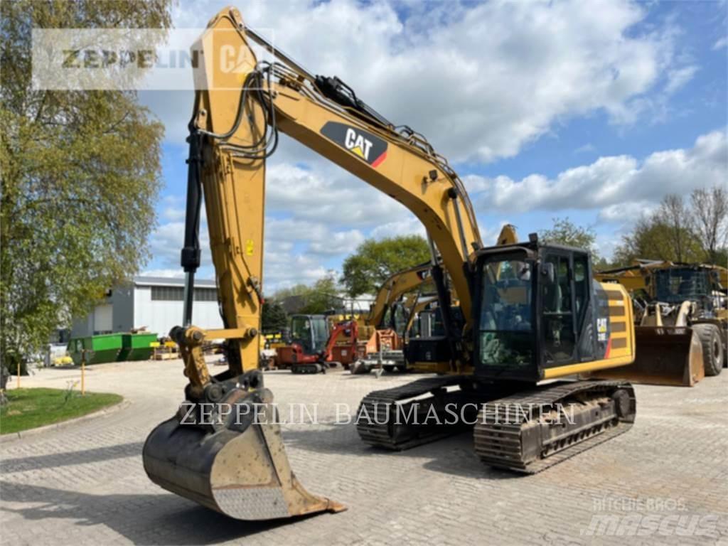 CAT 318EL Гусеничні екскаватори