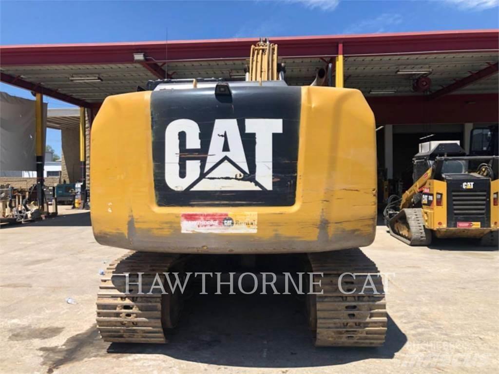CAT 318F Гусеничні екскаватори