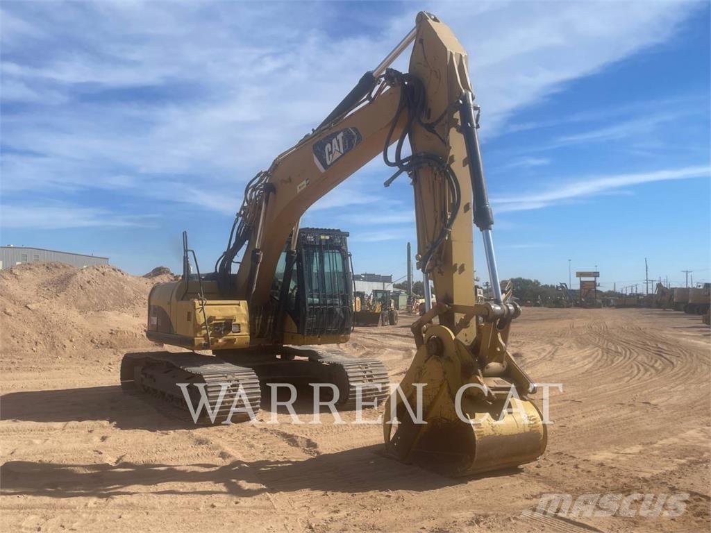 CAT 320DL Гусеничні екскаватори