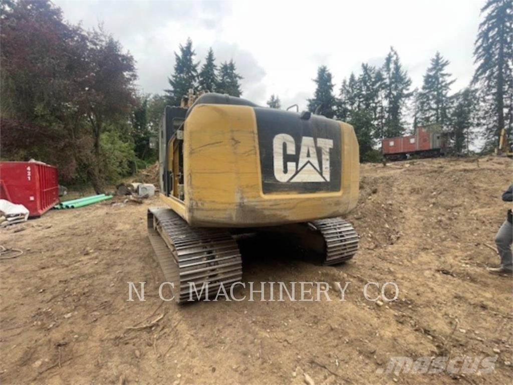 CAT 320E Гусеничні екскаватори