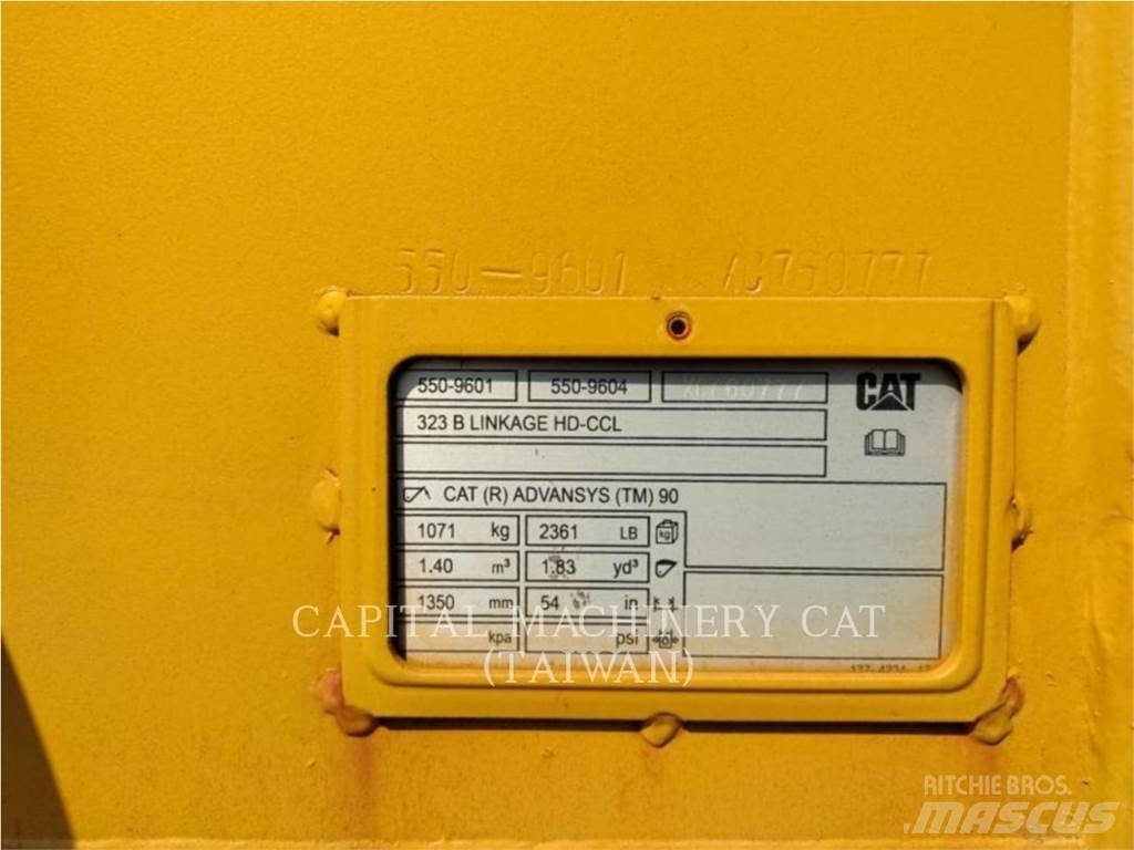 CAT 323 Ковші
