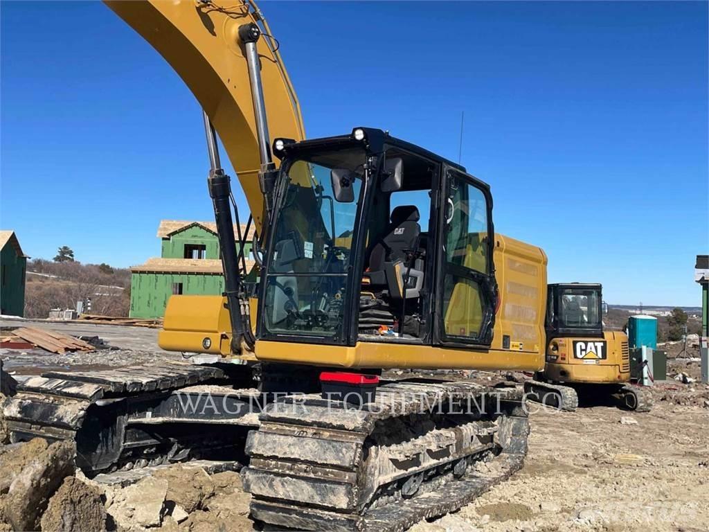 CAT 323 Гусеничні екскаватори