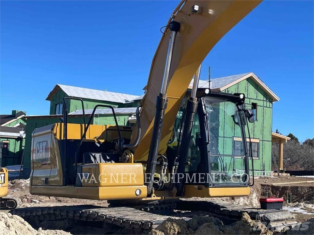CAT 323 Гусеничні екскаватори