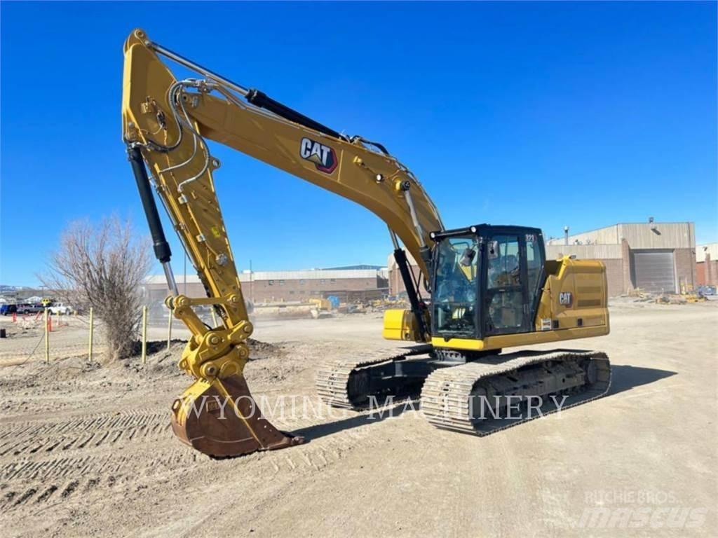 CAT 323 Гусеничні екскаватори