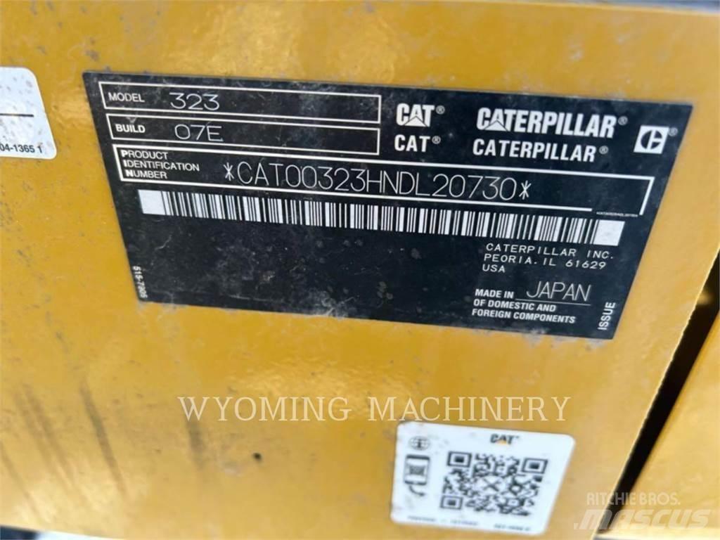 CAT 323 Гусеничні екскаватори