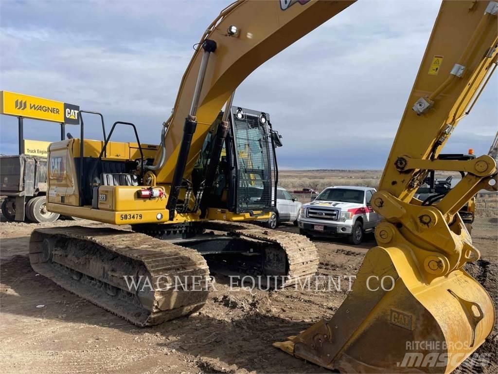 CAT 323 Гусеничні екскаватори