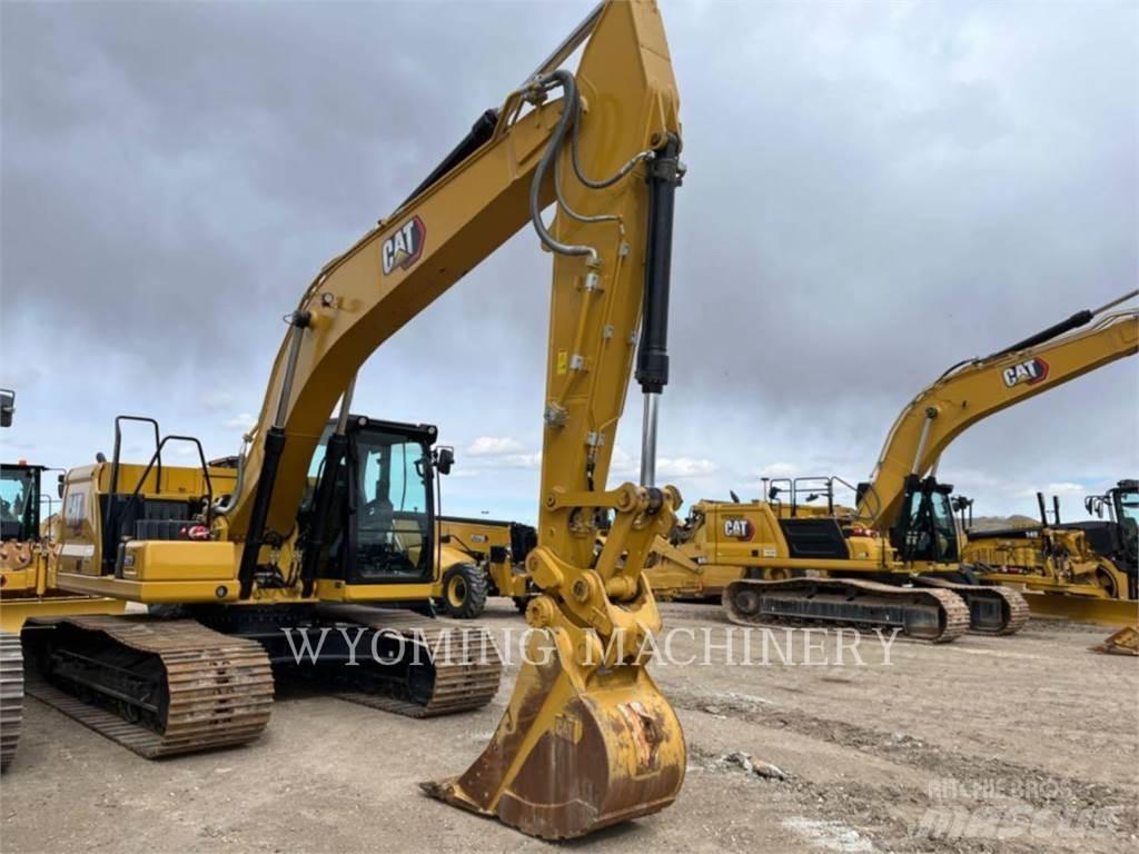 CAT 323 Гусеничні екскаватори