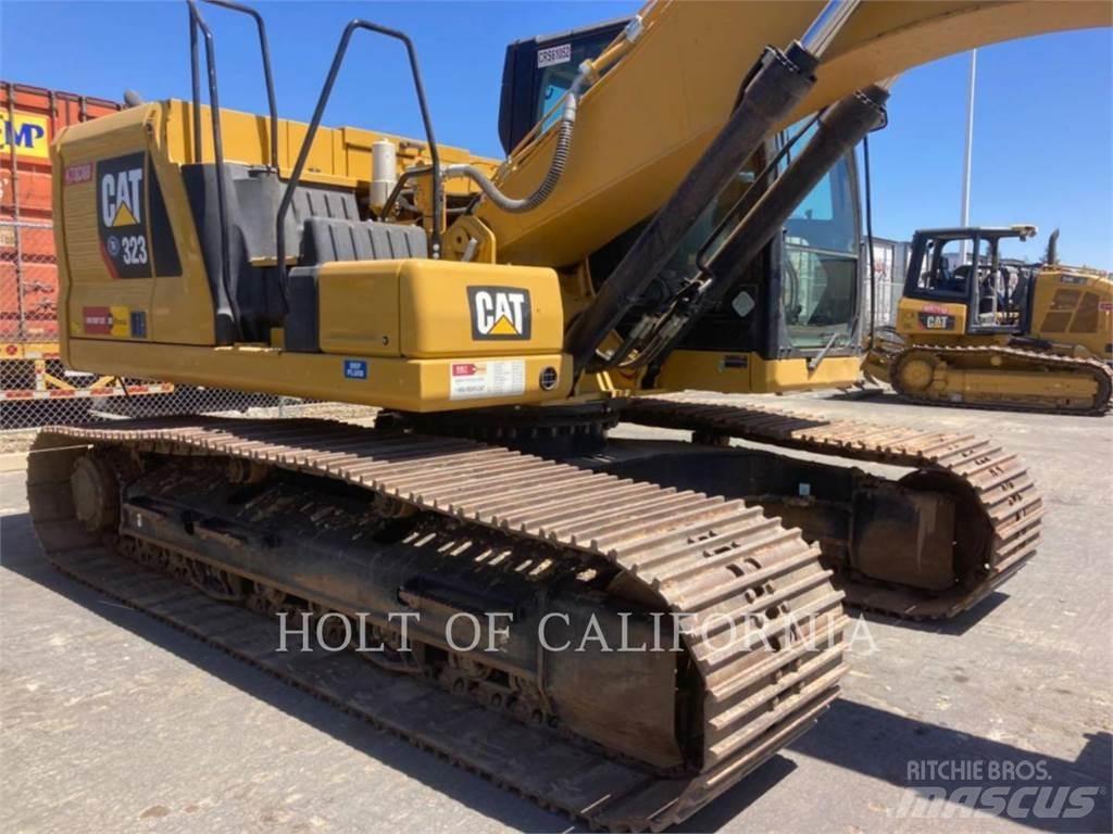 CAT 323 Гусеничні екскаватори