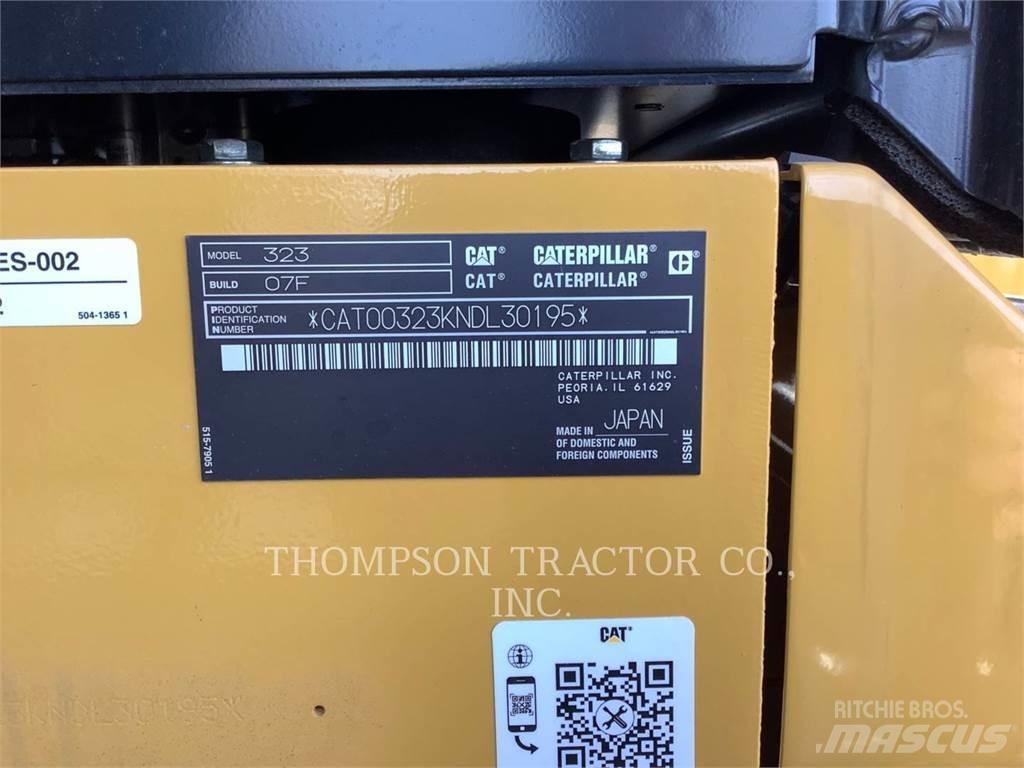 CAT 323 Гусеничні екскаватори