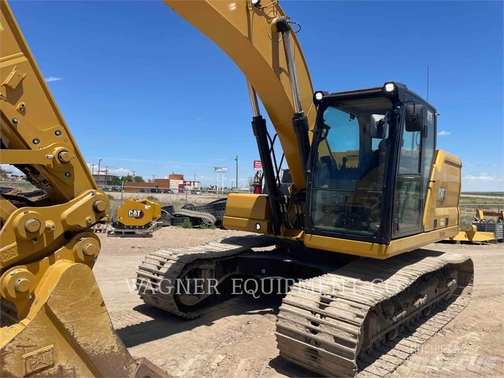 CAT 323 Гусеничні екскаватори