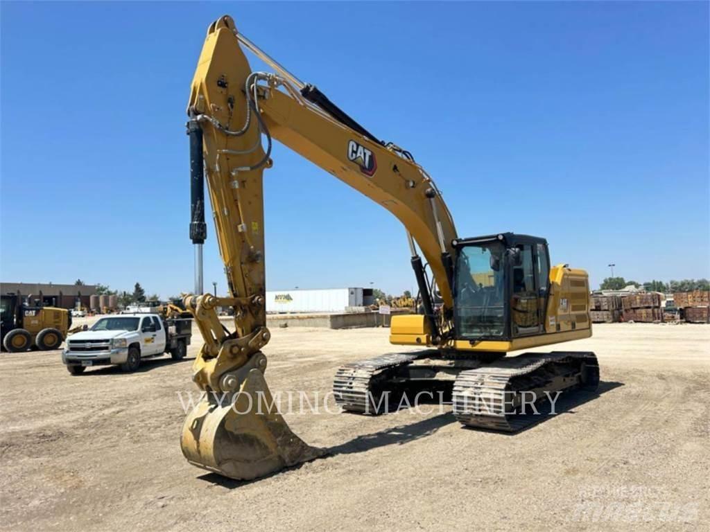 CAT 323 Гусеничні екскаватори