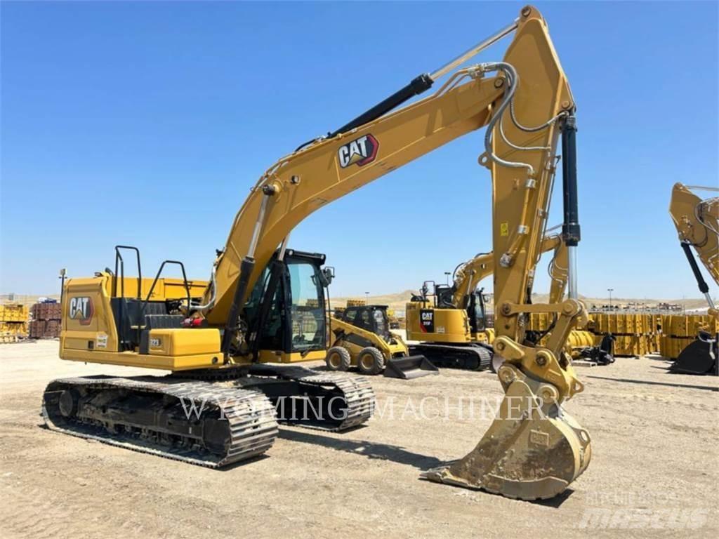 CAT 323 Гусеничні екскаватори