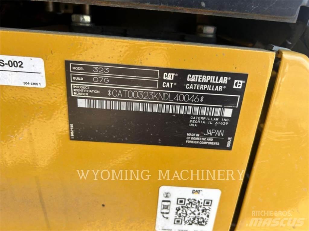CAT 323 Гусеничні екскаватори