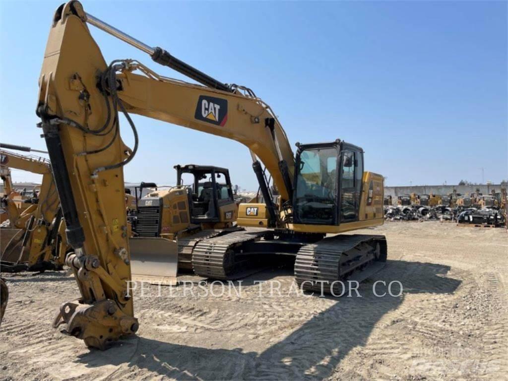 CAT 323 Гусеничні екскаватори